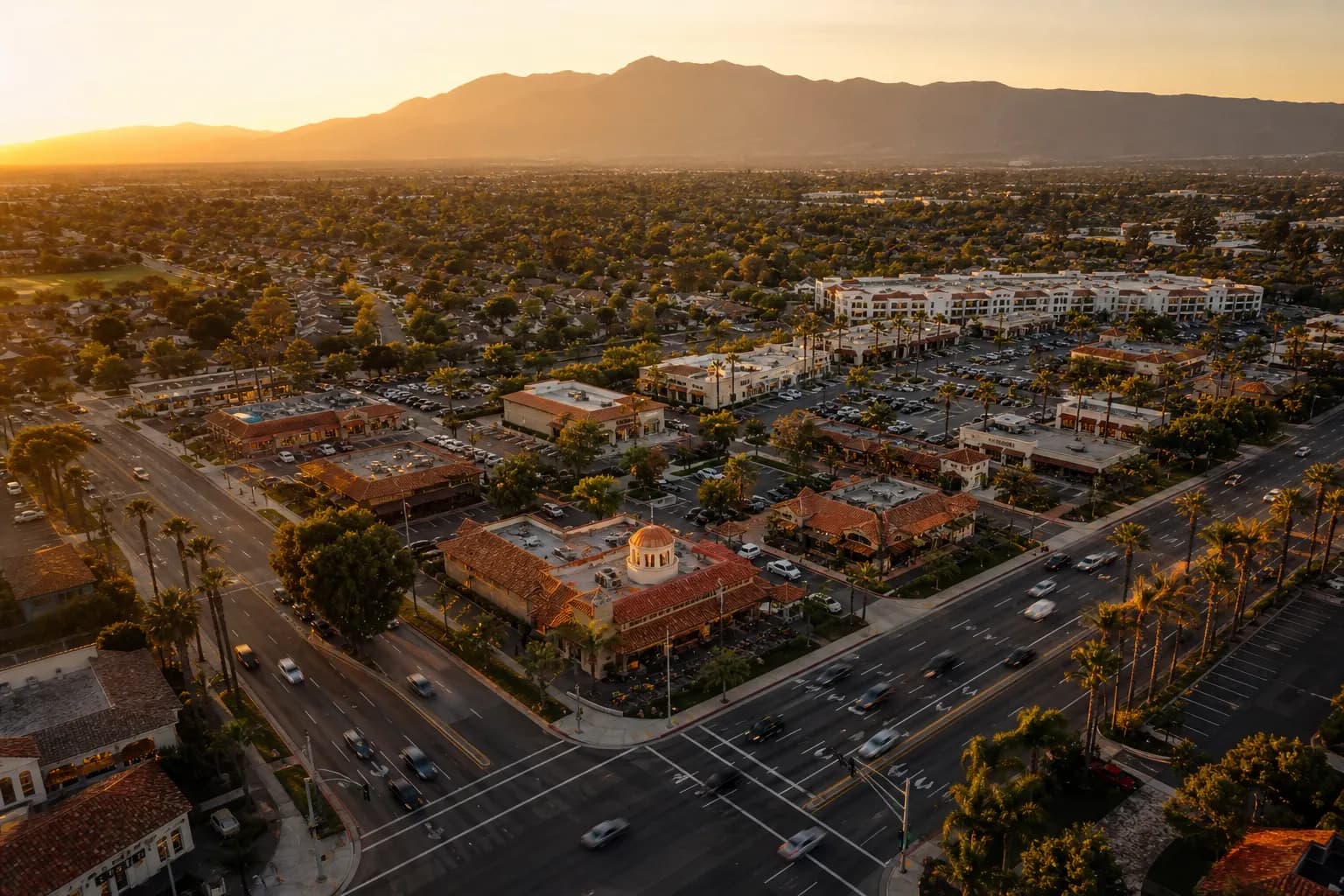 Aerial view of Fountain Valley restaurant district at golden hour