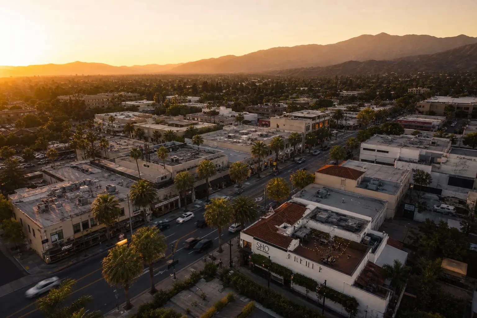 Aerial view of San Dimas restaurant district at golden hour