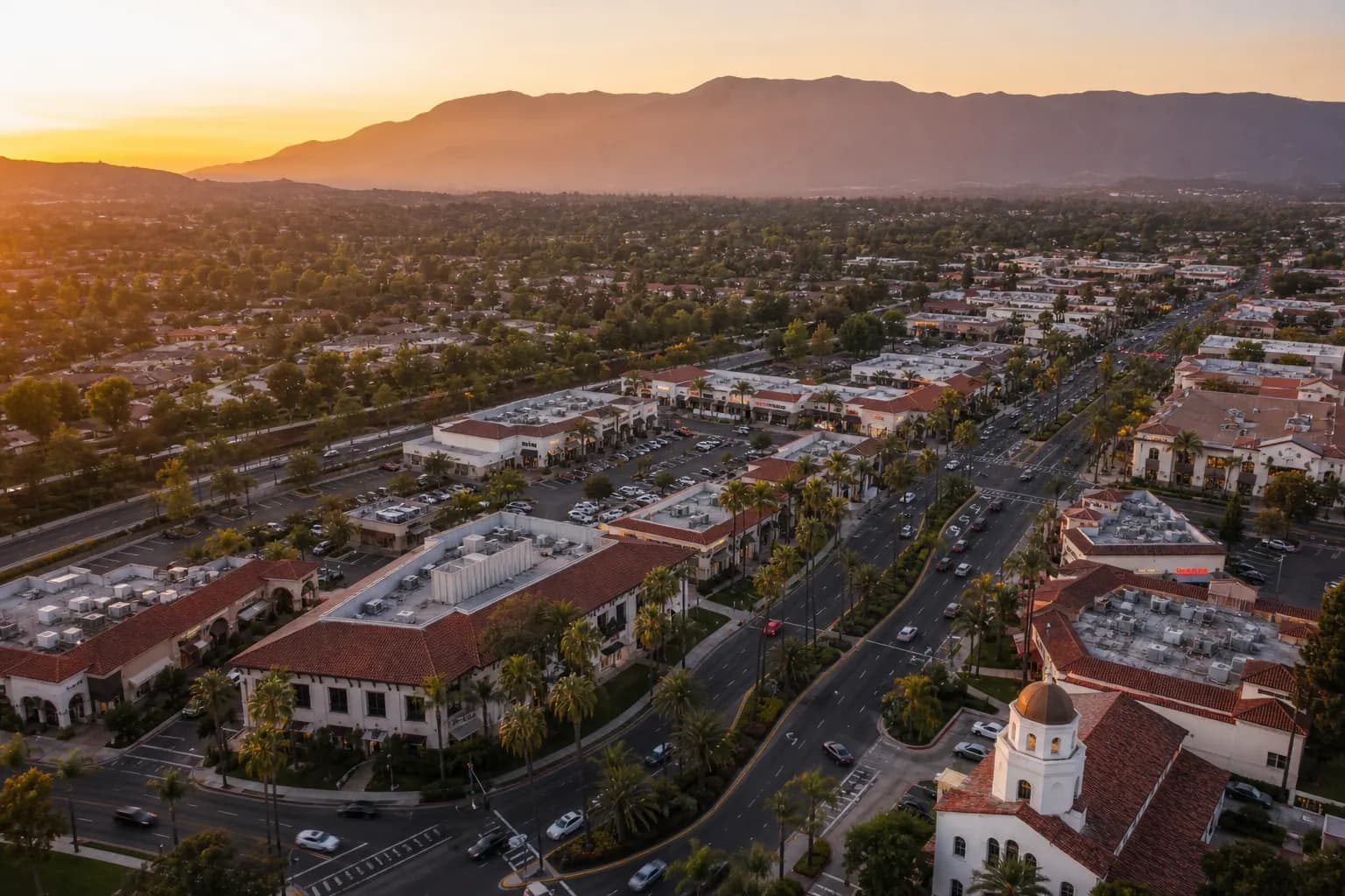 Aerial view of Laguna Woods restaurant district at golden hour