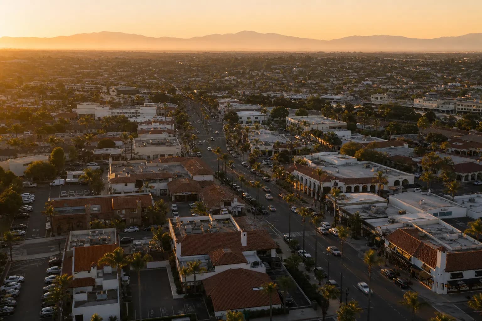 Aerial view of Newport Beach restaurant district at golden hour
